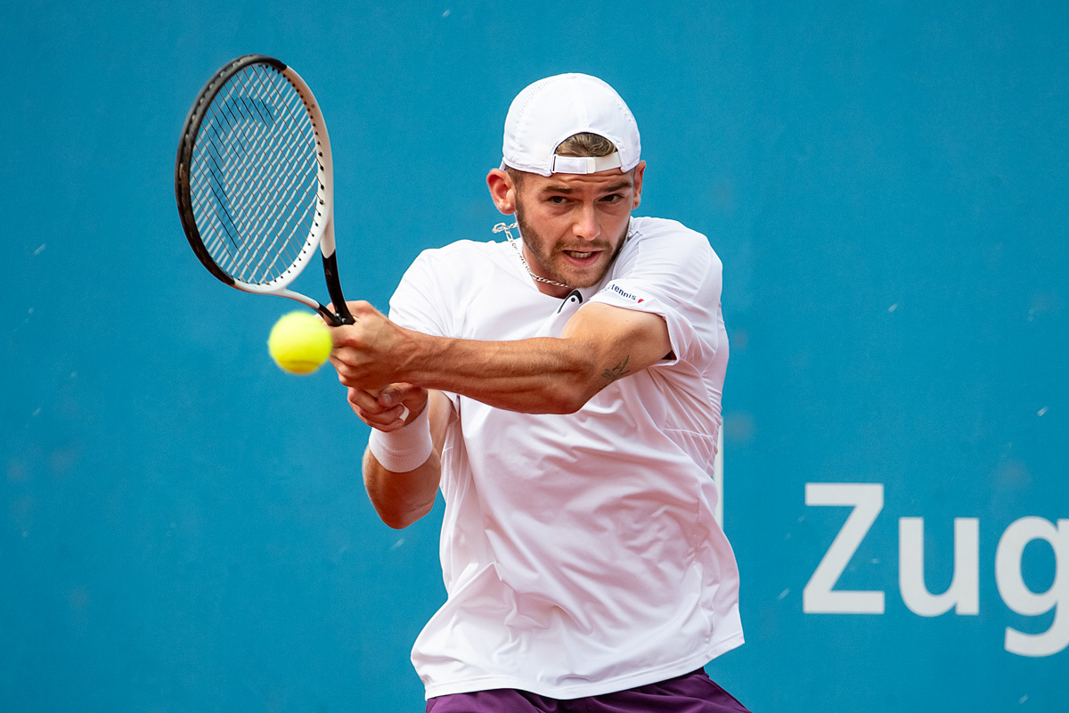 Tennisprofi Jérôme Kym in Action